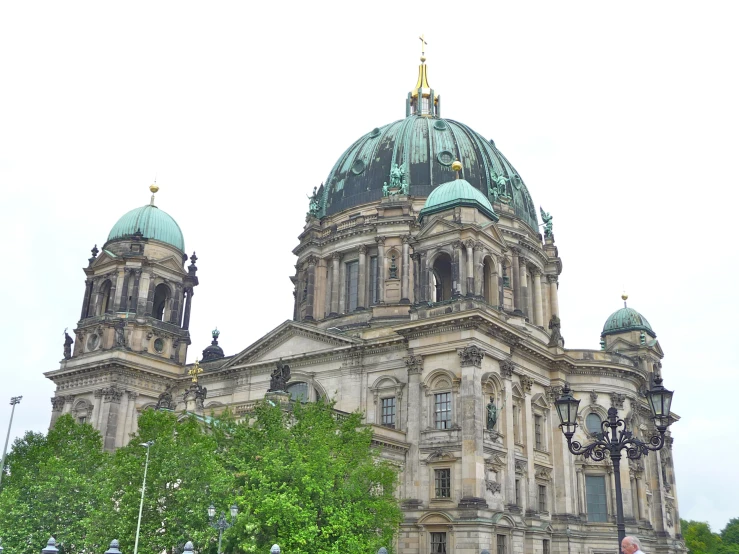 an old building with three domed roof tops