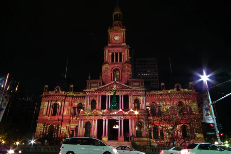 the cathedral has been decorated with bright lights for christmas