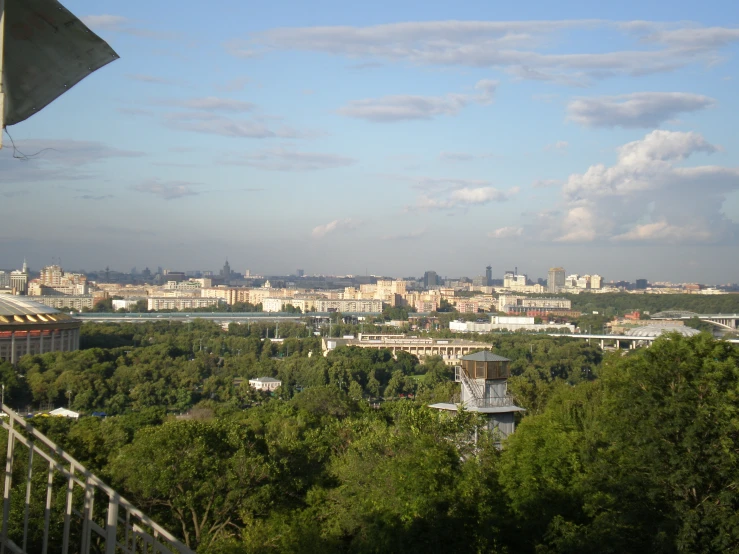 the city is surrounded by trees and buildings