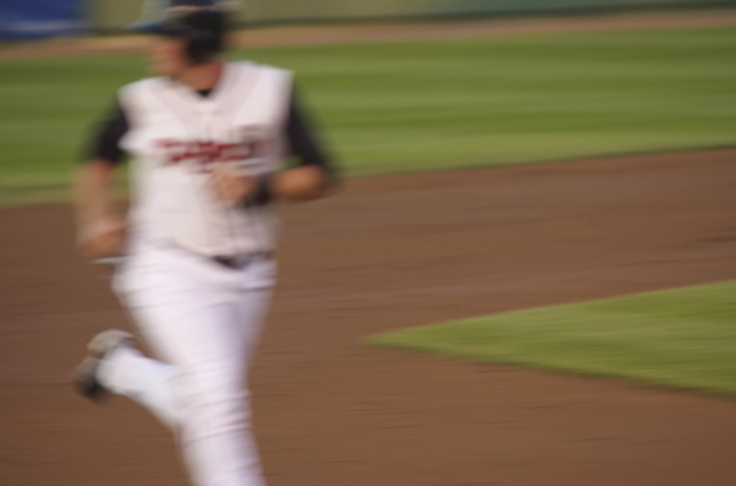 a baseball player running on the field