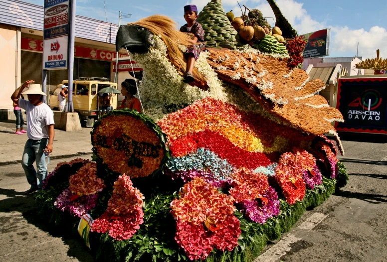 a parade float in the middle of a city street