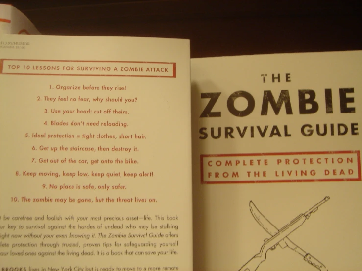 the book title reads, the zombie survival guide complete instruction from the living dead