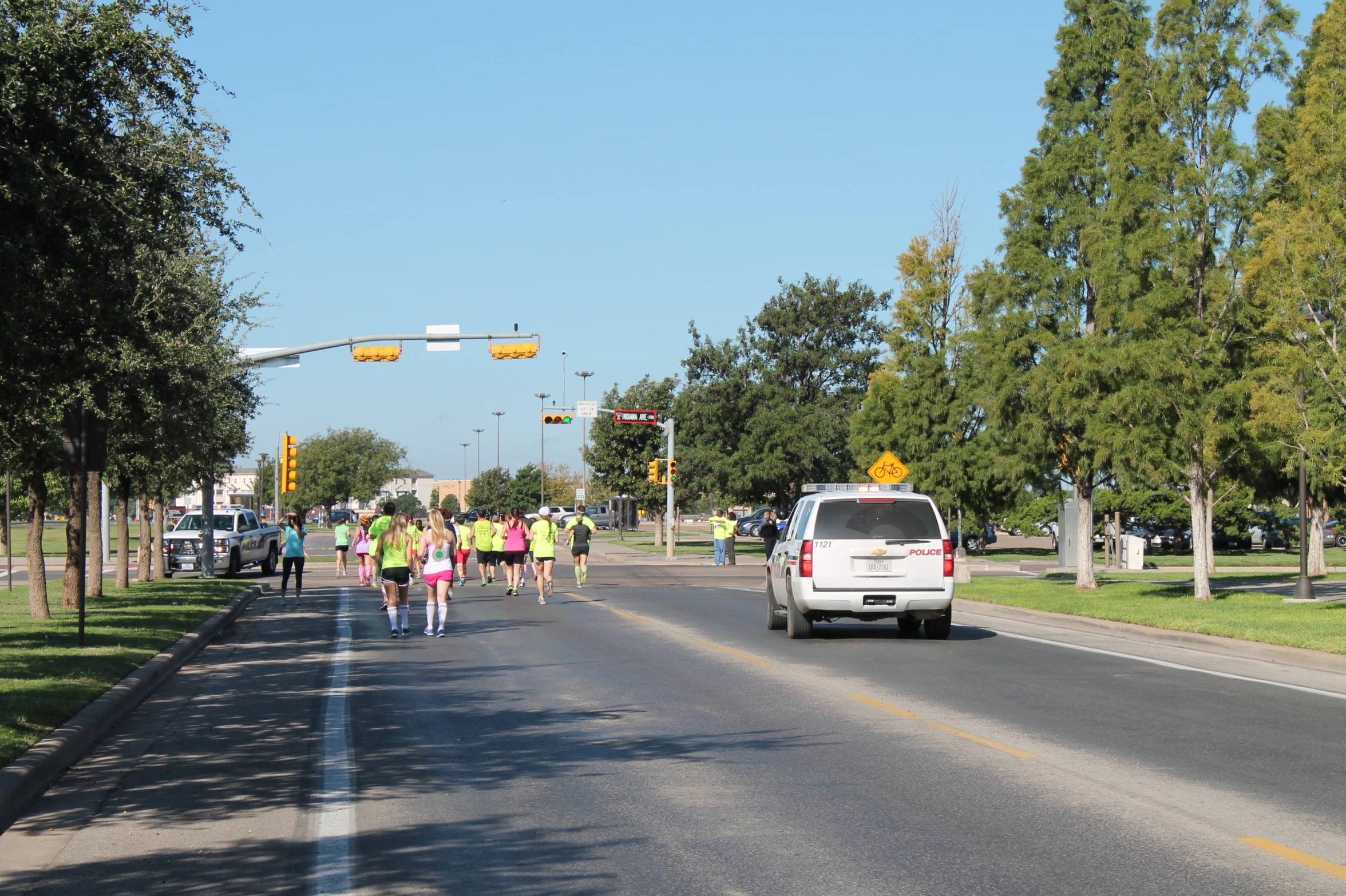 a large group of people walking down a street