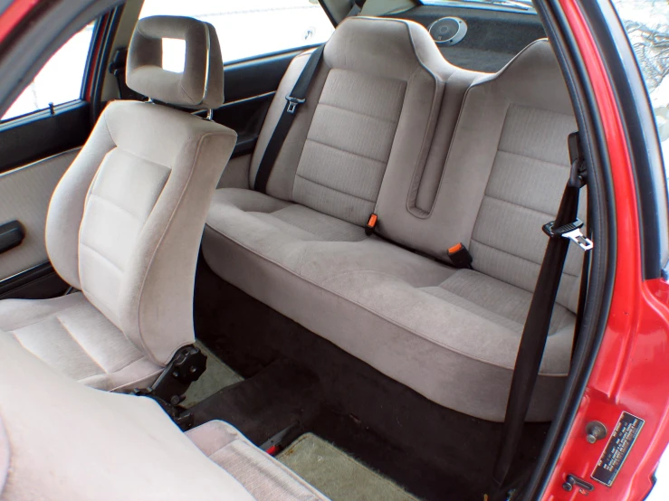 the inside of an automobile showing it's driver's seat covers