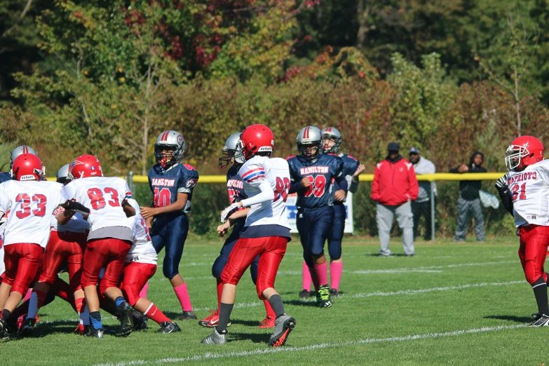 a group of s playing a game of football