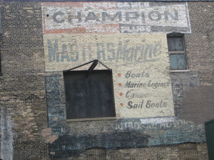 old advertit on the side of a building