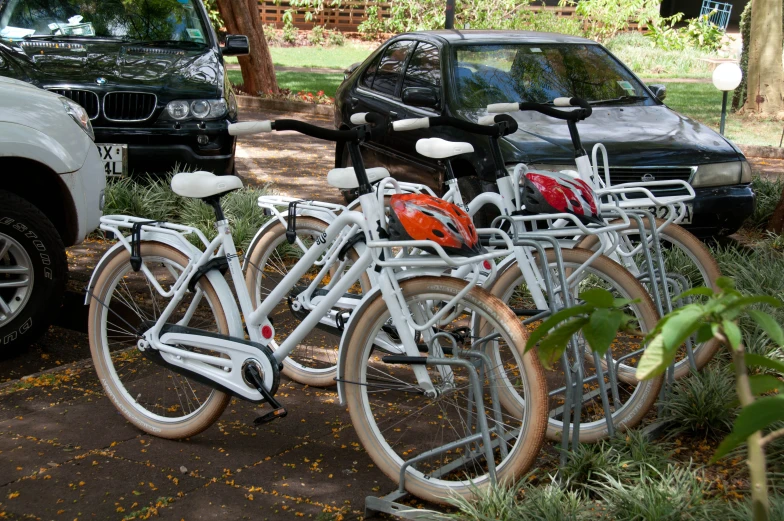 a bunch of bikes parked next to each other