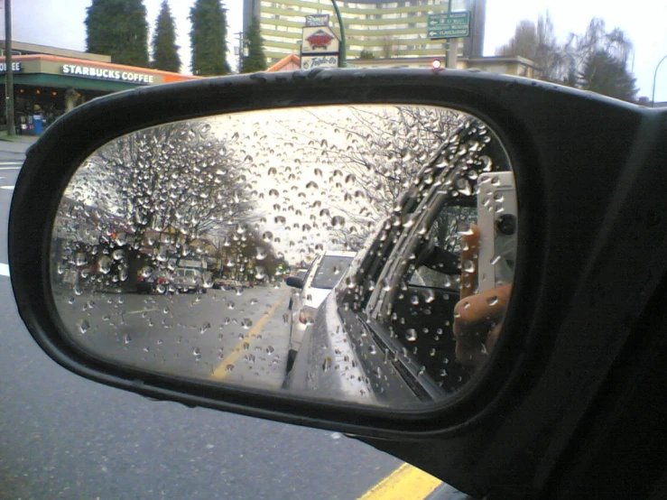 a view from inside a vehicle of a wet windshield
