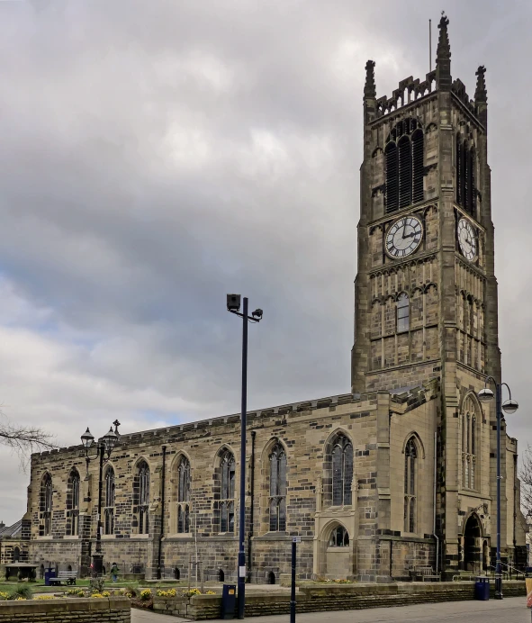 a castle type building with two tall clock tower on top