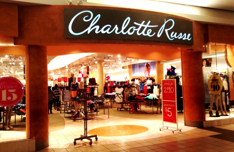 the entrance to charlotte rose is seen in a retail store