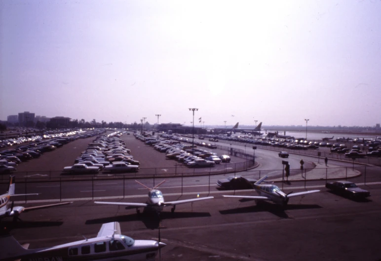 an airport with many planes parked at it