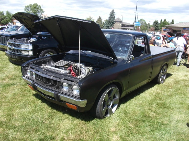 an older model truck with its hood open