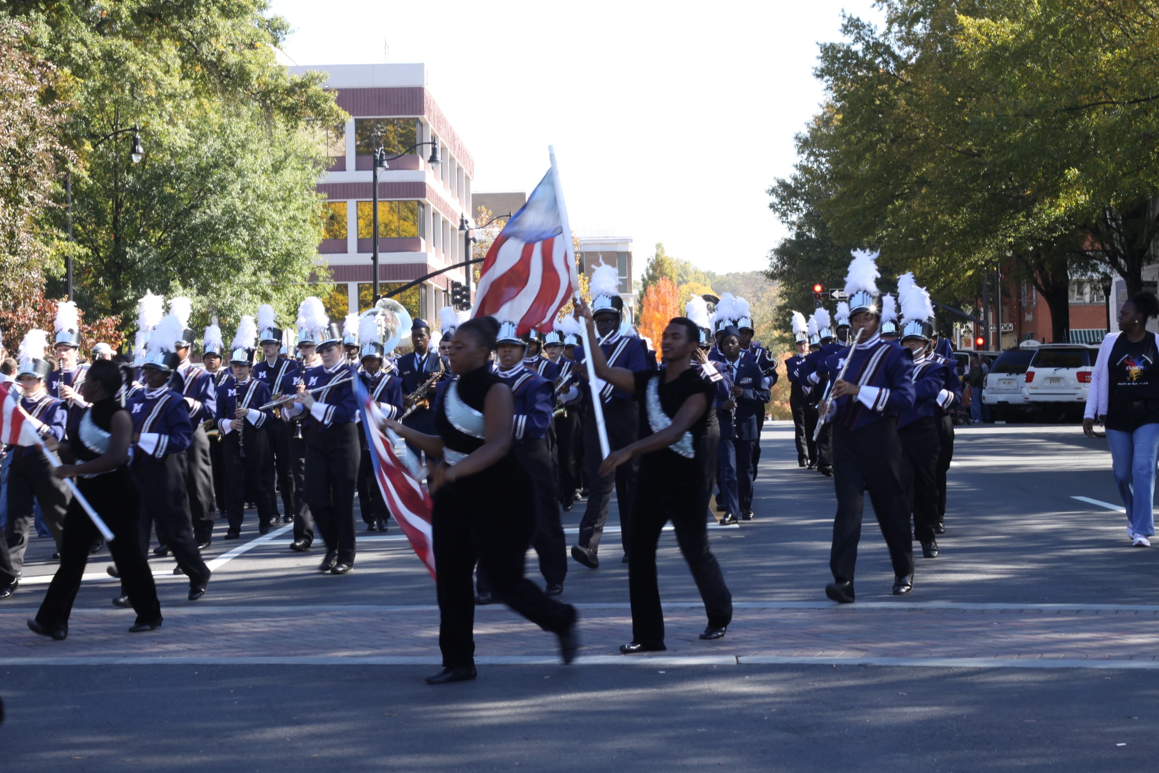 band marching down a street in a parade