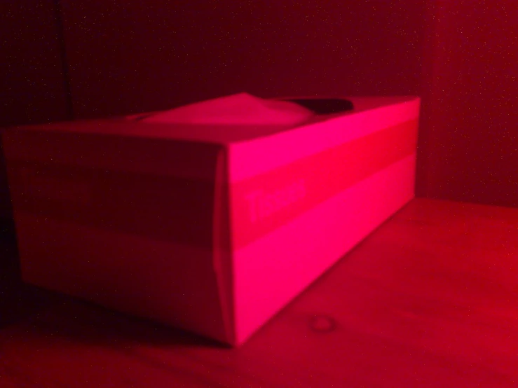 an empty red storage unit with red lighting