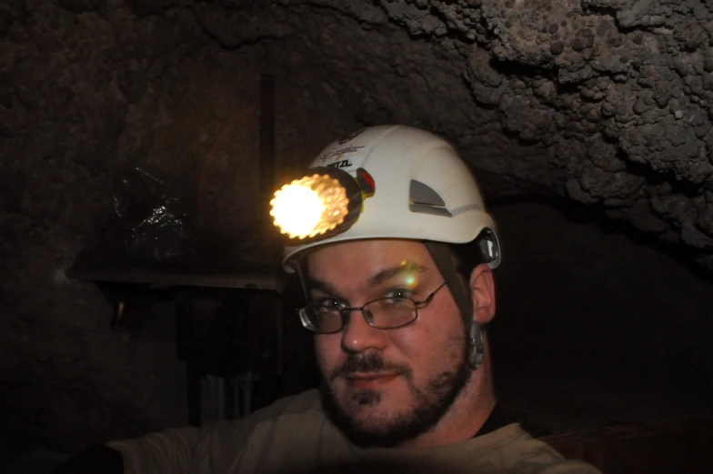 a man in a hard hat wearing a helmet