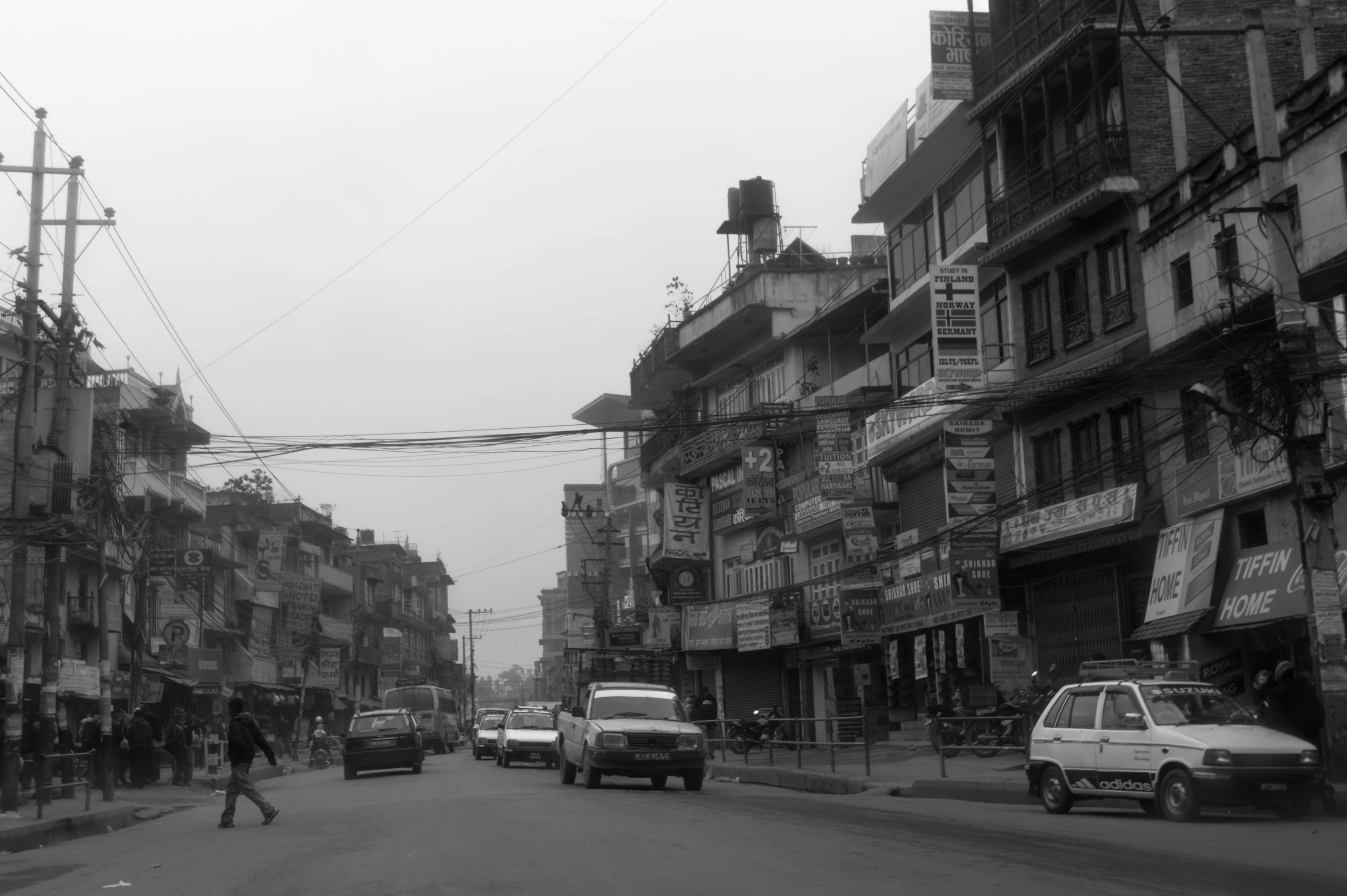 a black and white po of a city street