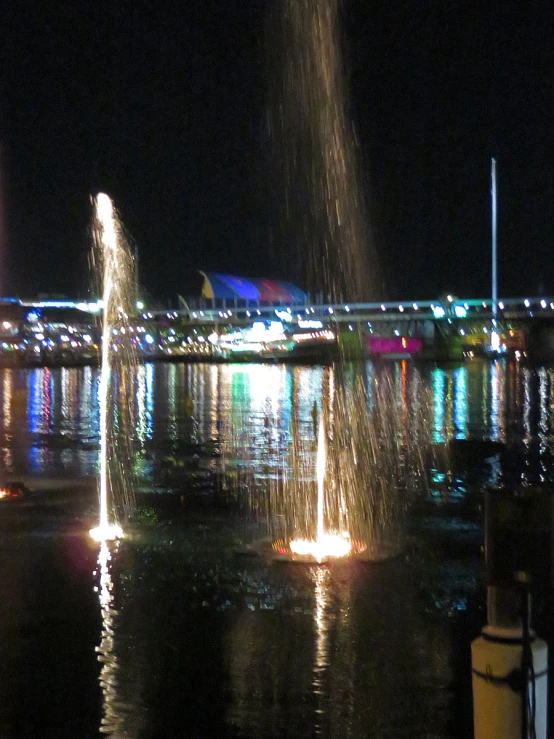 water features from the night, near a bridge