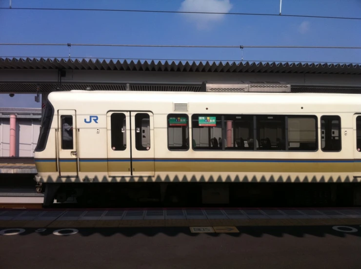 a train sits in the station with one open window