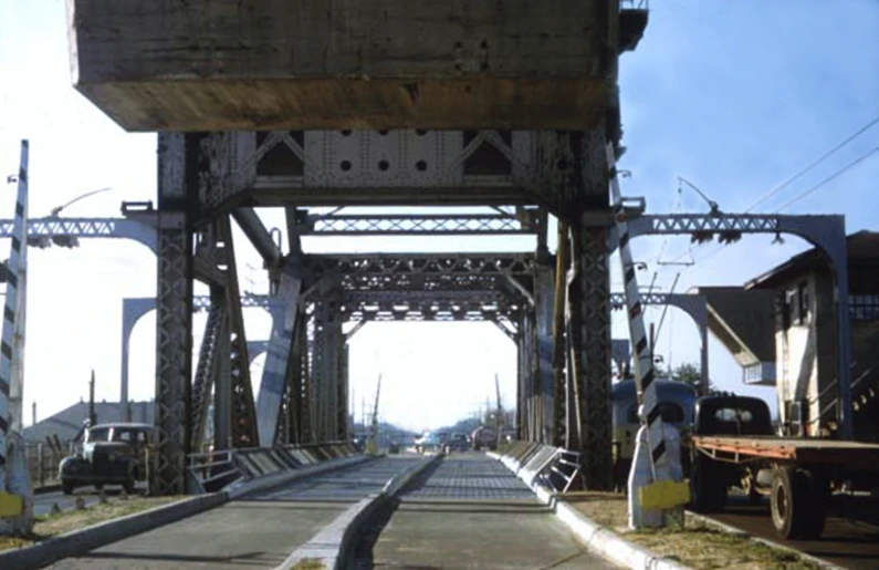 a large metal bridge being held in a building