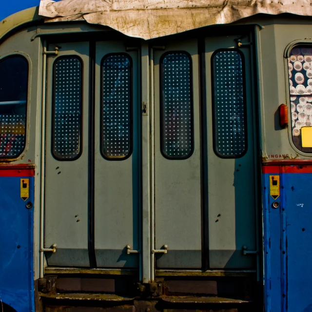 an open train caboose is shown with many doors