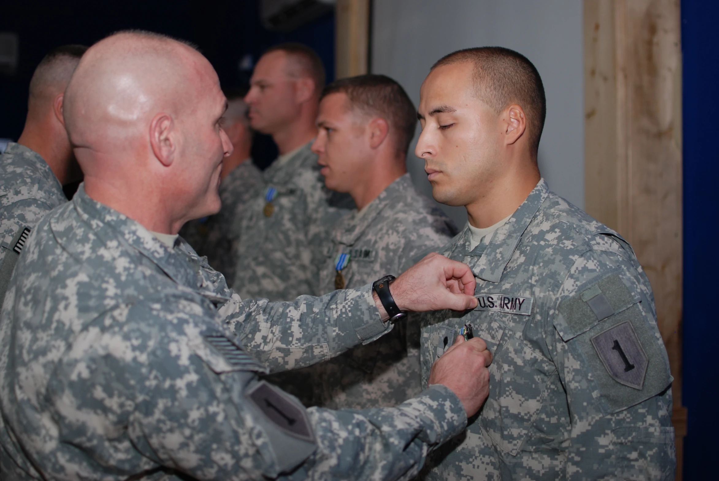 some military officers are standing together