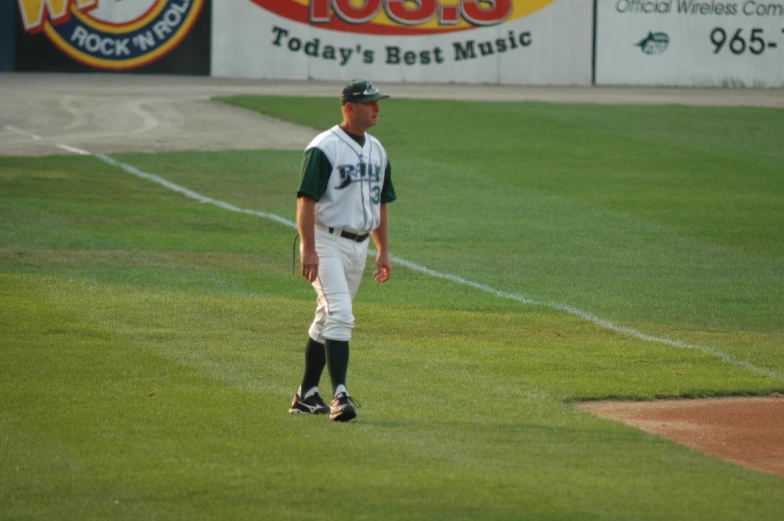 there is a male baseball player on the field