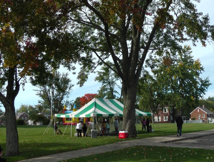 tents at the fair on the side of the road