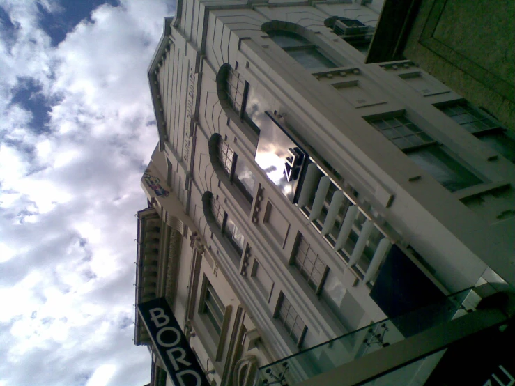 the corner of an old building that has been painted white