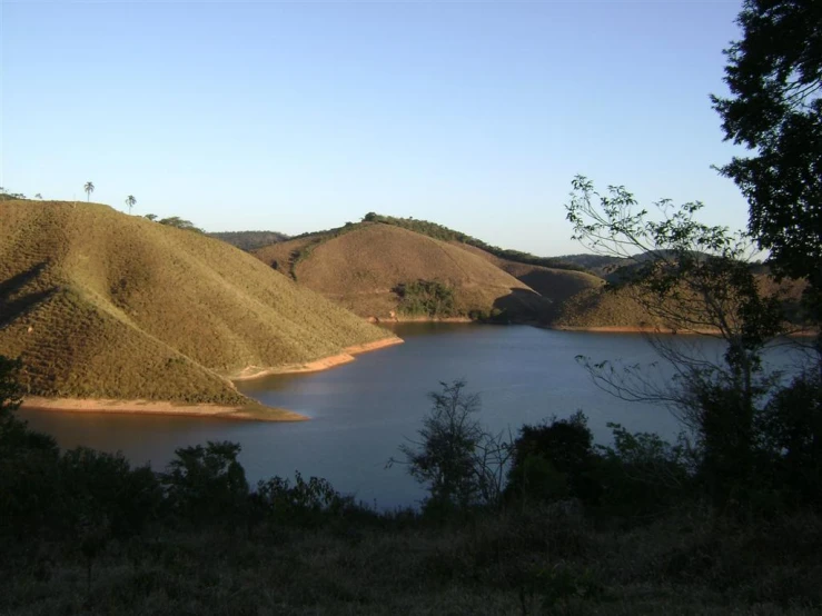 the large body of water is in the middle of the field