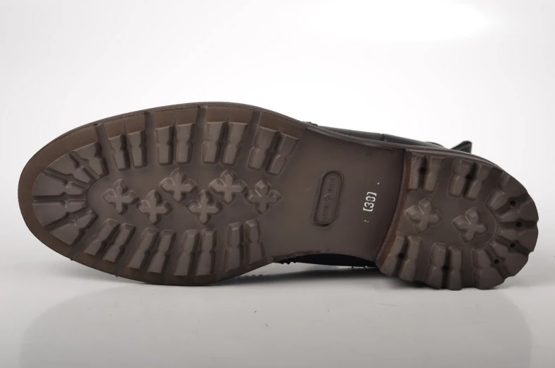 the shoe sole of a man's black shoes