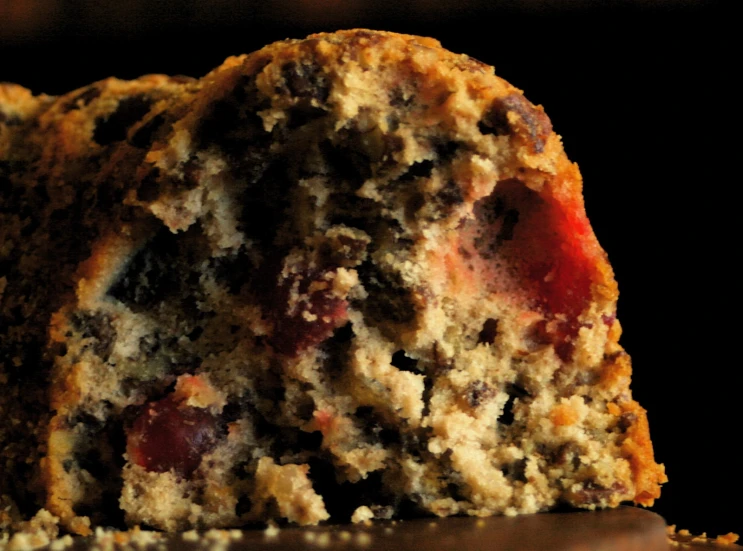 closeup of a cake with some fruit on it