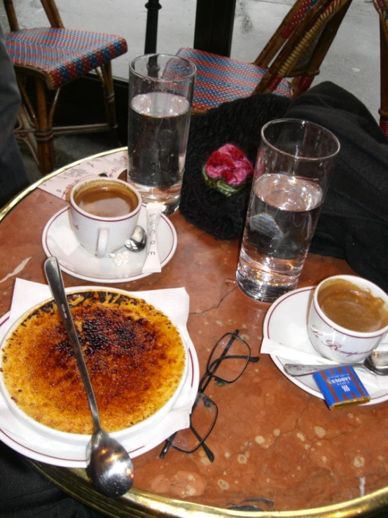 a close up of a plate of food with a beverage