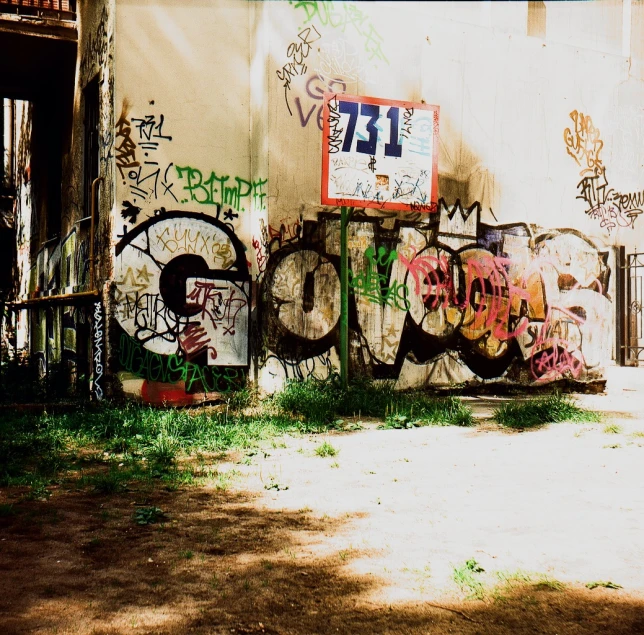 a wall with graffiti and a fire hydrant