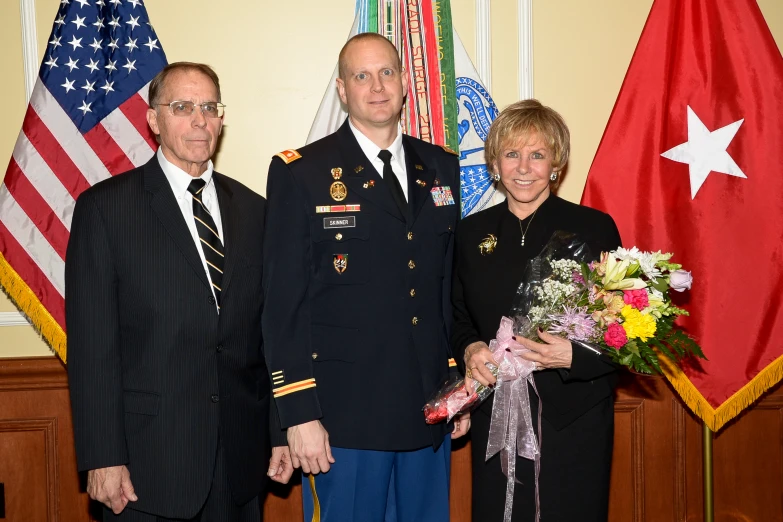 two men in uniform standing next to each other