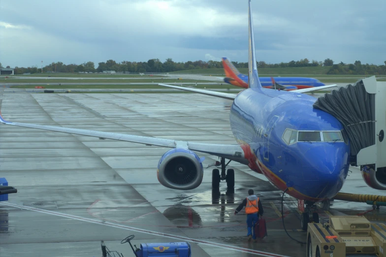 an airplane is parked with its doors closed