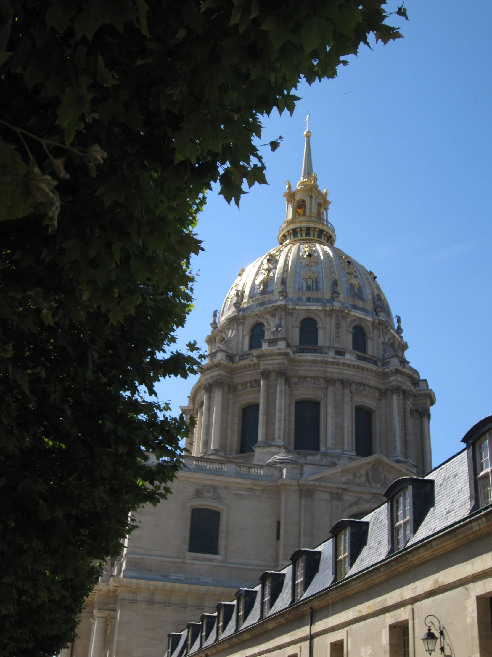 a building with a dome and a clock on the top