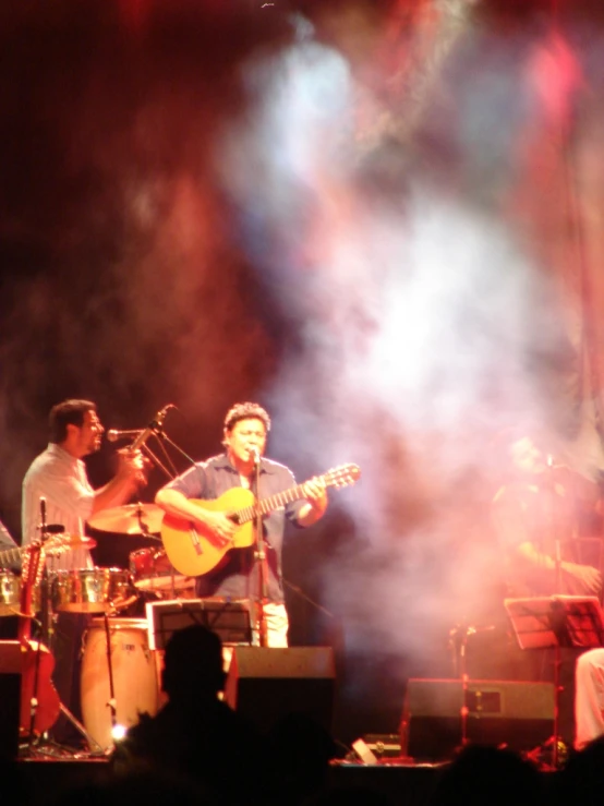 a band playing music while on stage