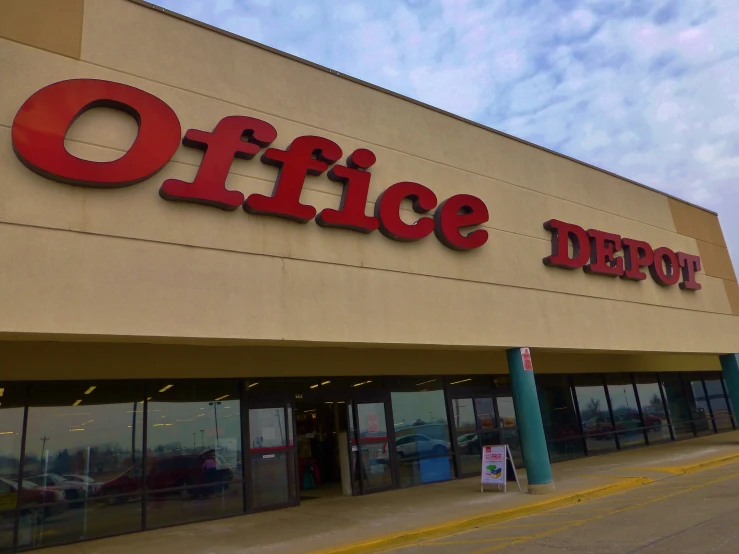 office depot with cars parked outside of its doors