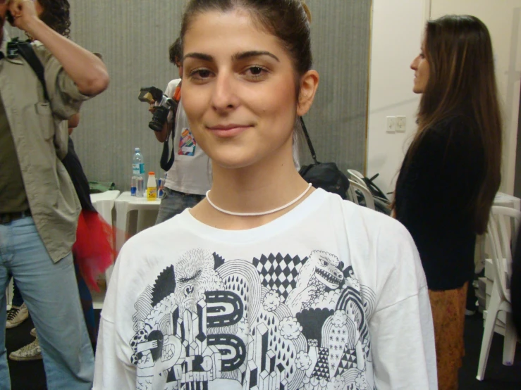 a person wearing a tee shirt at an event