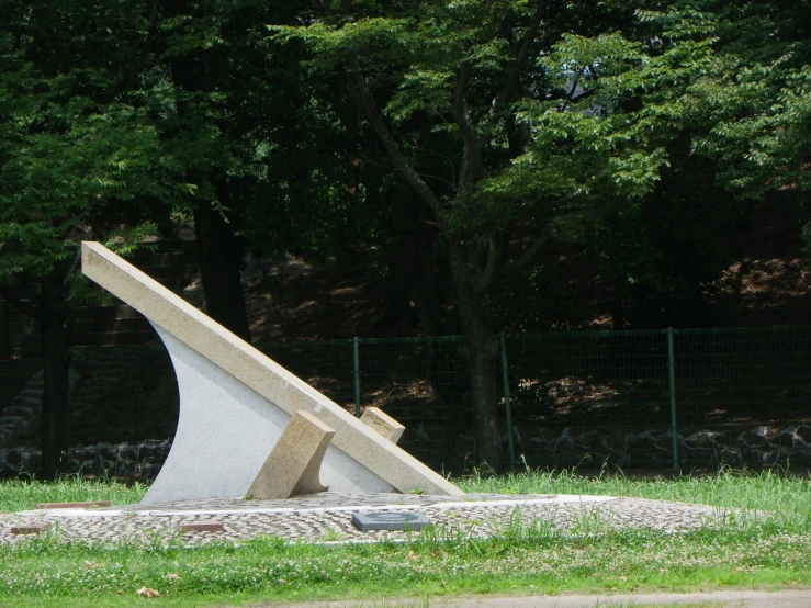 a sculpture that has been placed in the grass