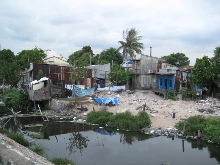 a bunch of destroyed buildings and some water