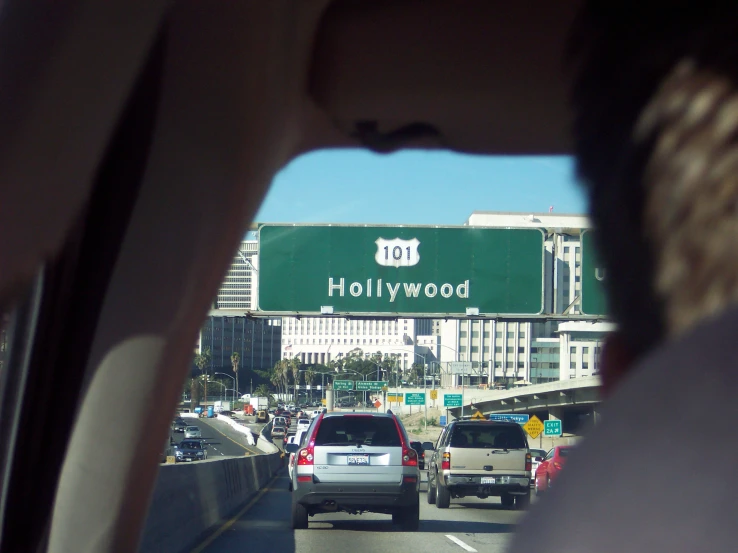 cars travel along a freeway in hollywood