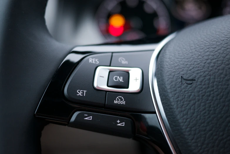 dashboard ons on car in vehicle showing speed, temperature and fuel