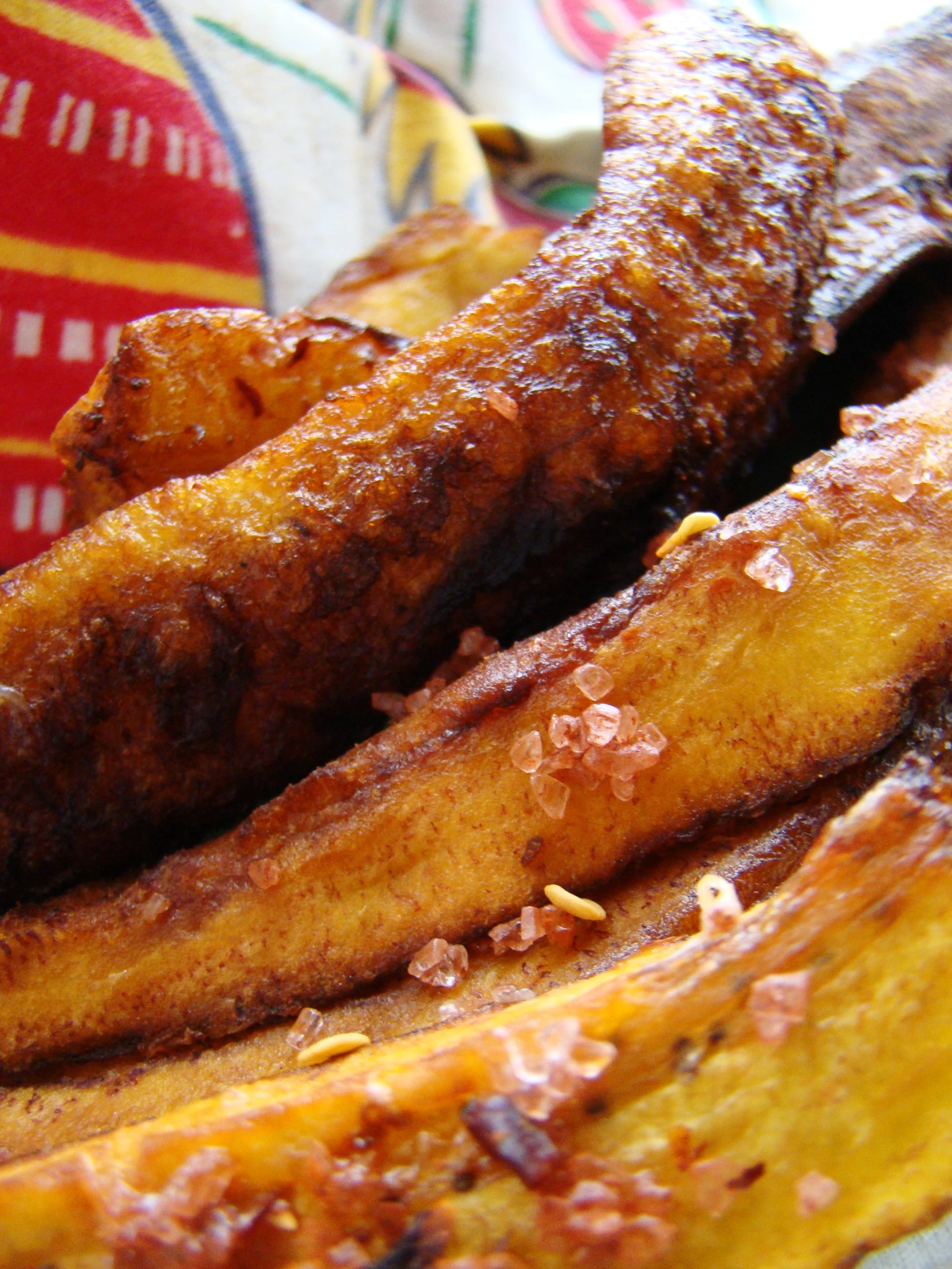 banana and a piece of meat on a table