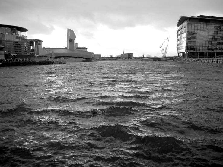 a boat is moving along the ocean waters