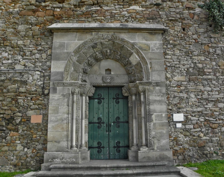 an old door that is very big on the outside