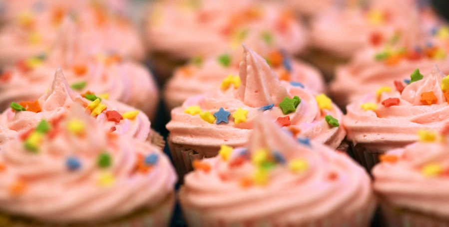 a closeup of some cup cakes in the po