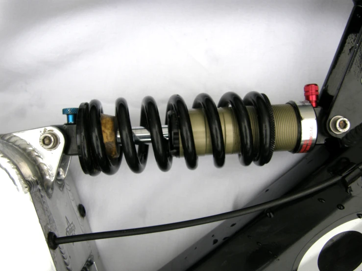 a rear shock is seen on a vehicle
