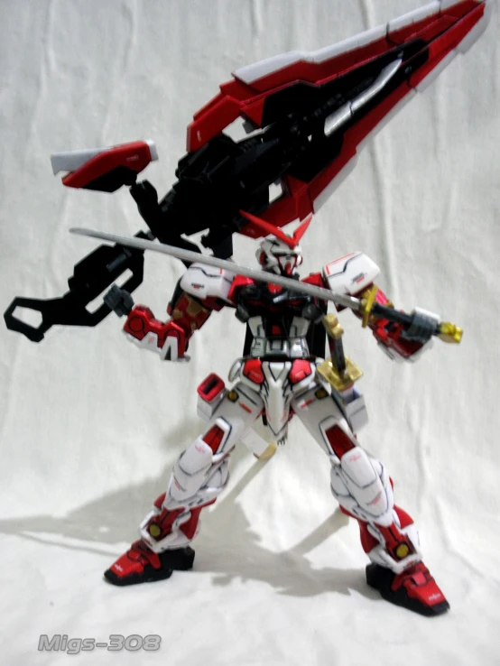 a red and white robot standing on its hind legs