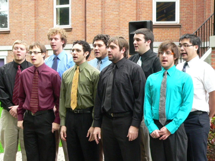 a group of men dressed up for a po